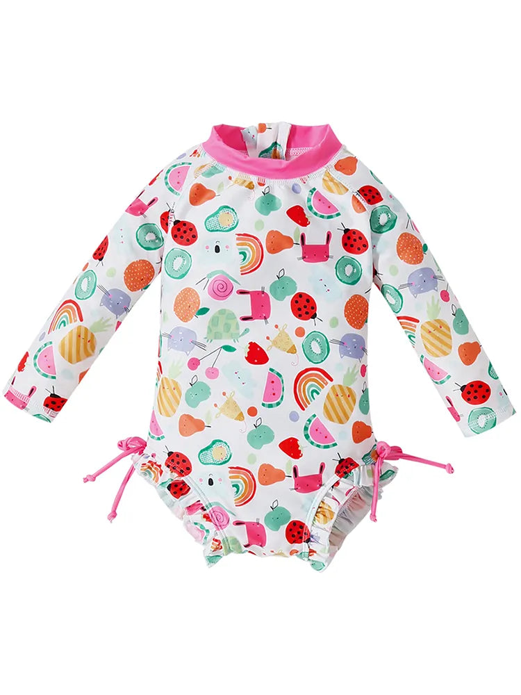 Toddler girl's printed long sleeve swimsuit for sun safety, a stylish piece of beachwear.