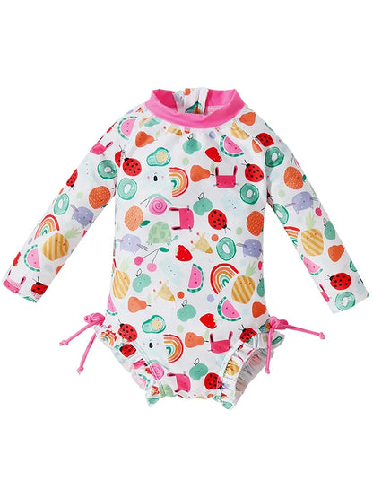 Toddler girl's printed long sleeve swimsuit for sun safety, a stylish piece of beachwear.