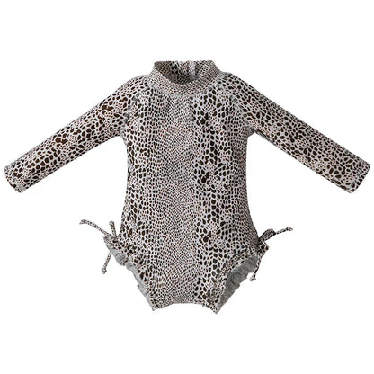Toddler girls' UV protect long sleeve swimsuit, vibrant print, ideal for beach adventures.