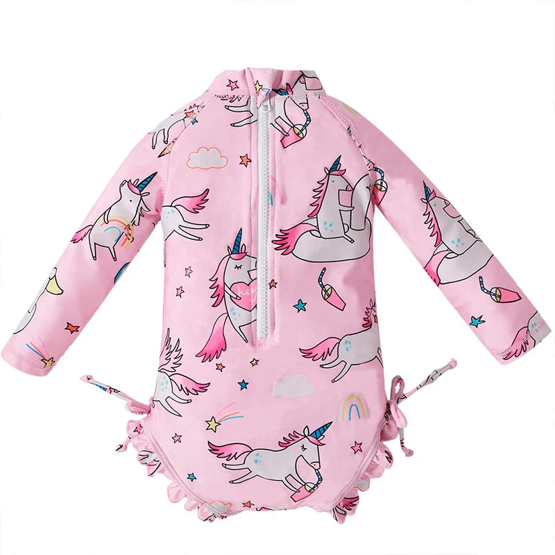 Toddler girl's long sleeve UV protect swimsuit, printed with cheerful summer motifs.