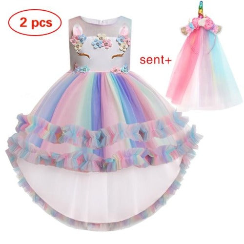 Close-up of girls' unicorn dress with ruffles, vibrant magical print, perfect for party wear