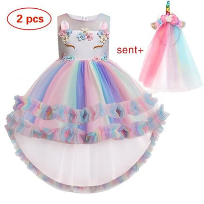Close-up of girls' unicorn dress with ruffles, vibrant magical print, perfect for party wear