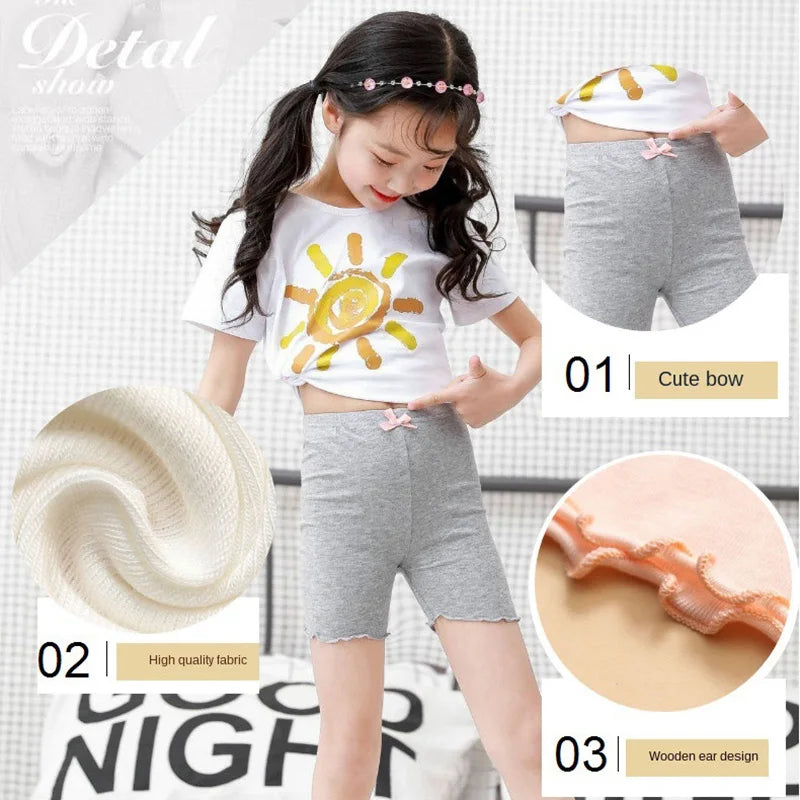 Soft modal girls' shorts with a delicate bow, perfect safety underpants