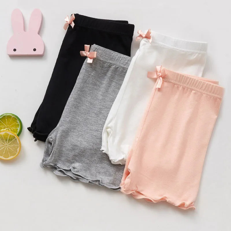 Comfortable girls' modal shorts with elastic waist and sweet bow detail