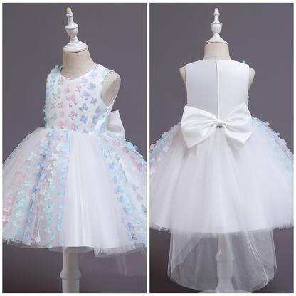 Full shot of a girls' pink and purple ombre floral special occasion ball gown with pearls