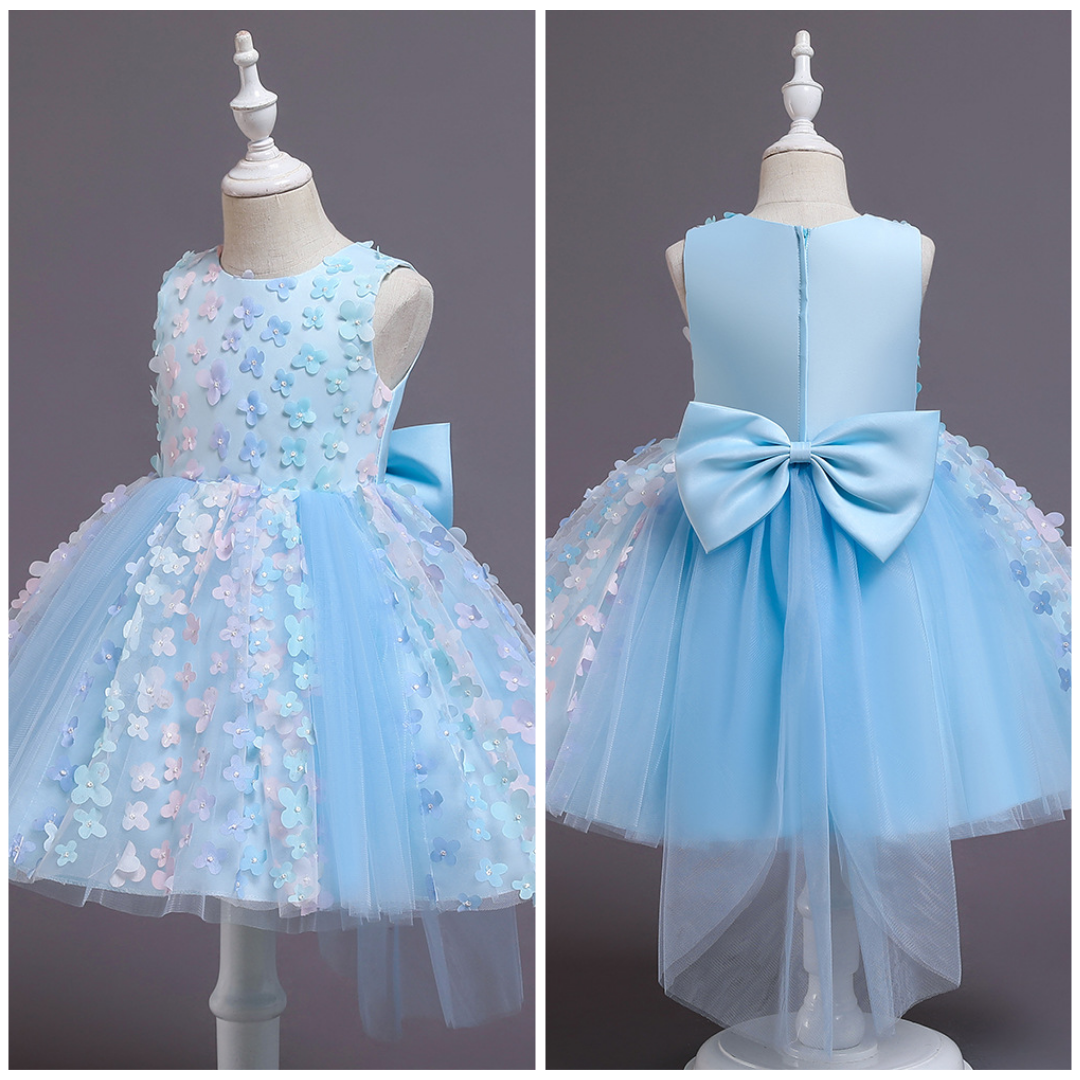 Back view of a girls' ombre floral ball gown dress featuring pearl embellishments