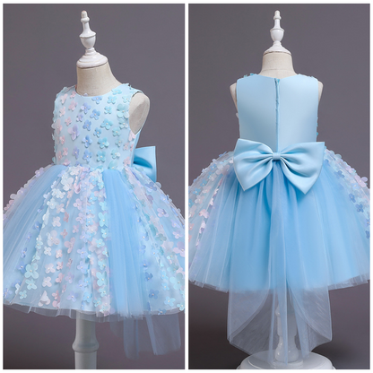 Back view of a girls' ombre floral ball gown dress featuring pearl embellishments