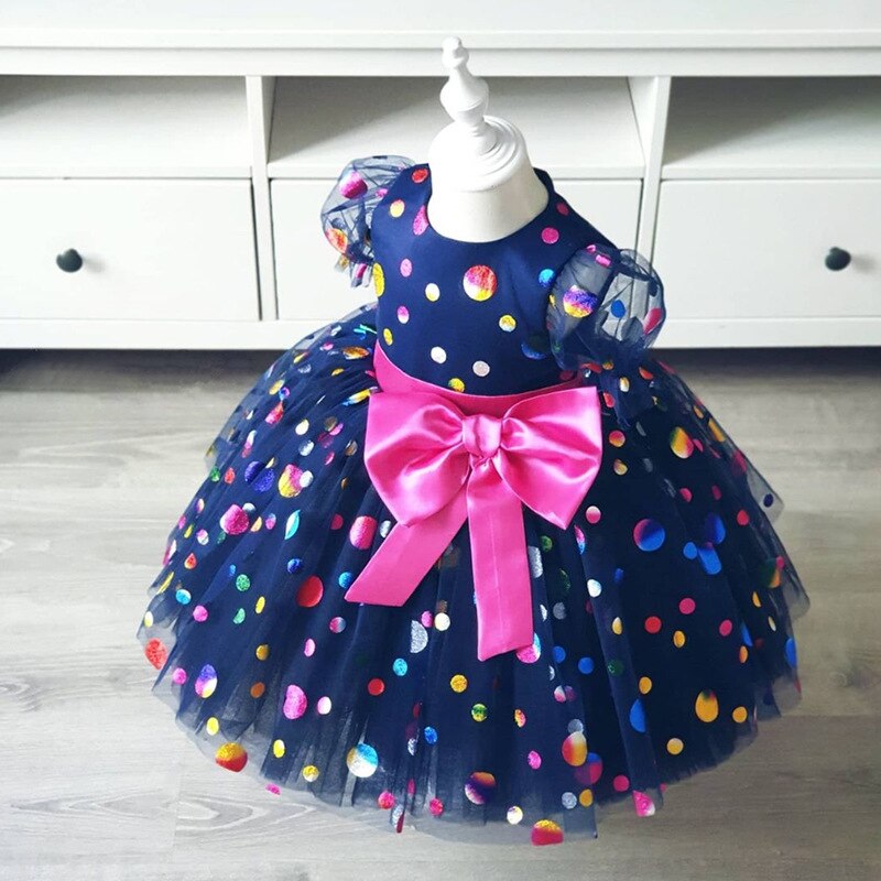 Little girl modeling an ombre floral pearl ball gown, a stunning party or princess dress