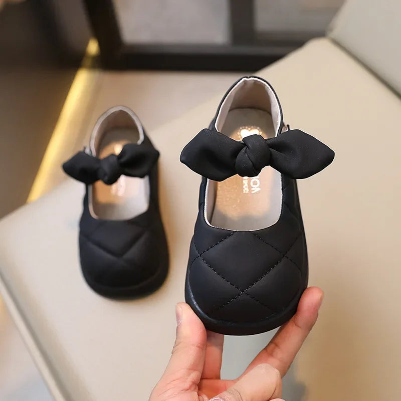 Pair of light pink girls' bowknot Mary Janes with soft leather, perfect comfortable toddler shoes