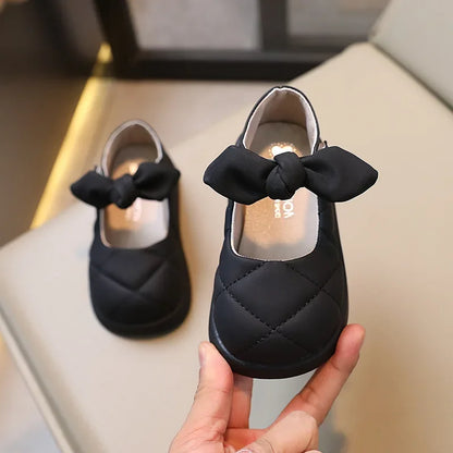 Pair of light pink girls' bowknot Mary Janes with soft leather, perfect comfortable toddler shoes