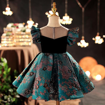 Little girl modeling a pink butterfly sleeve princess ball gown, 'retro' kids' special occasion dress