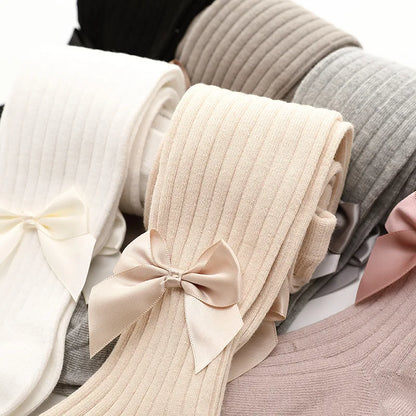 Soft peach-colored girls' cotton bow socks, perfect for a subtle princess touch, all season