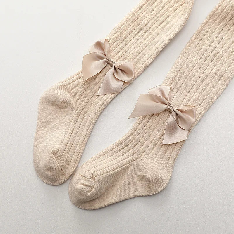 Girls' cotton socks with beautiful ribbon bow, adding a charming detail to any children's outfit