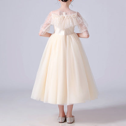 Kids formal wear: elegant girls' ball gown with dotted tulle, ruffles, and sequin accents