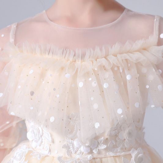 Full view of a girls' special occasion dotted tulle ruffle sequin dress, ideal for parties