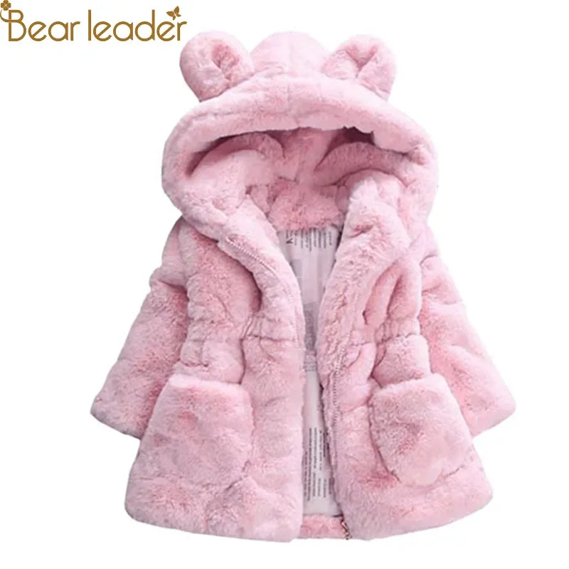 Detail of the soft faux fur lining inside a girls' hooded winter coat