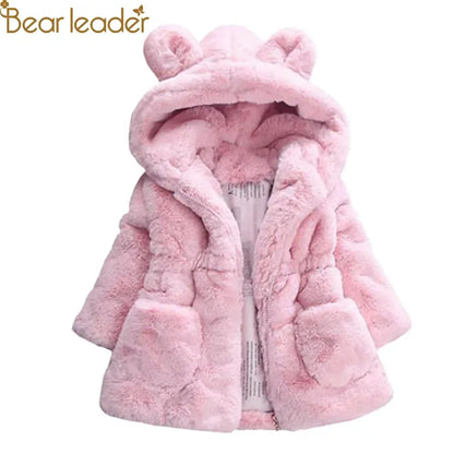 Detail of the soft faux fur lining inside a girls' hooded winter coat