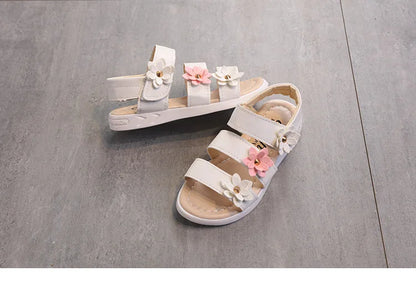 Kids' summer gladiator sandals with vibrant floral accents and a soft footbed