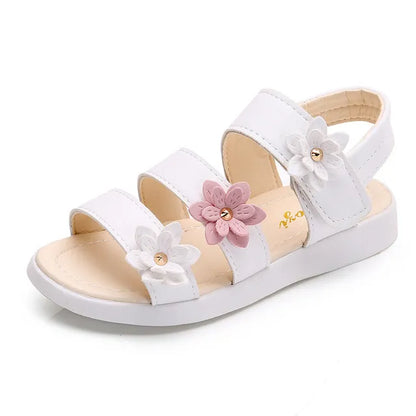 Girl's comfortable summer gladiator sandal in a cheerful floral design, full length