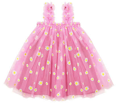 Close-up of the delicate tulle layers and floral pattern on a girls dress