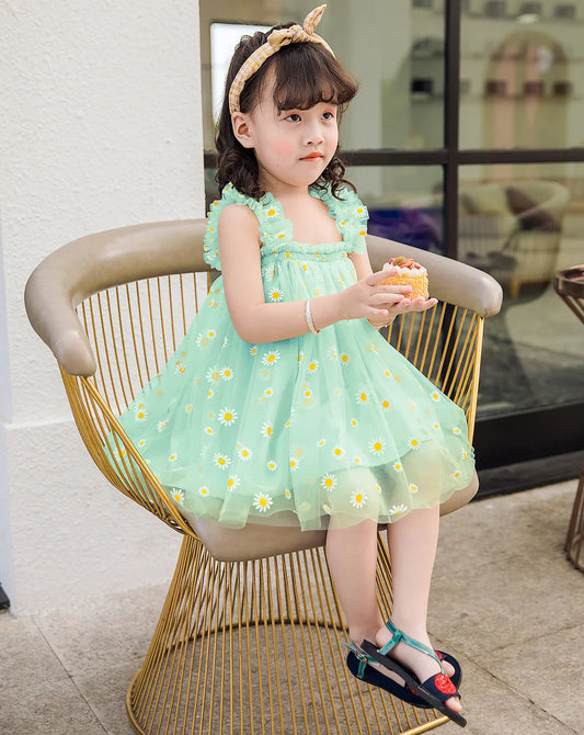 Toddler girl twirling in a multi-layered pink tulle princess dress for parties
