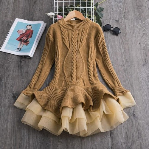 Infant girl in a cozy knitted flare dress, a beautiful long sleeve princess outfit for special occasions