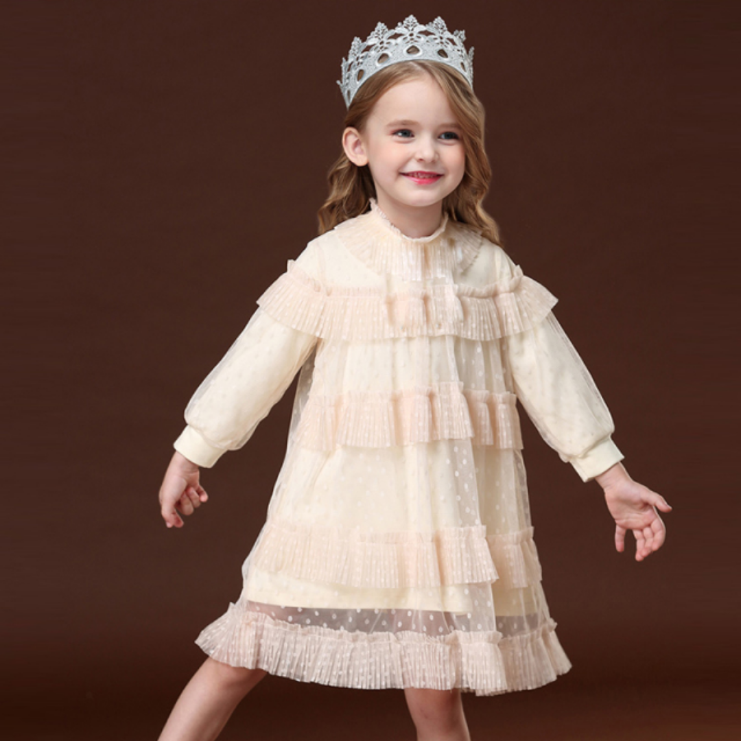 Girls' pink lace ruffle puff sleeve princess dress for parties or birthdays, made of soft cotton.