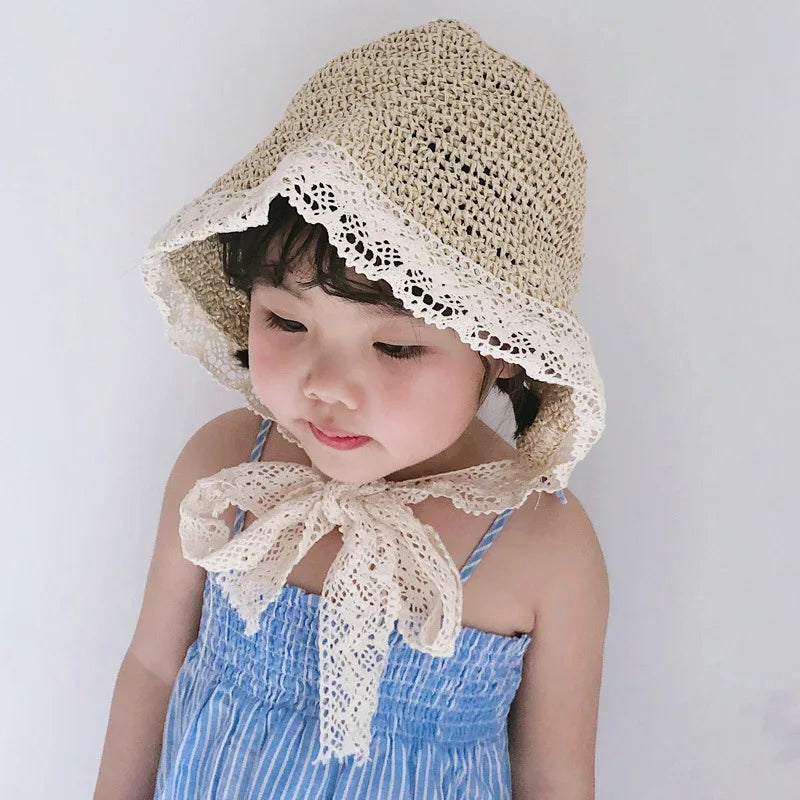 Display of girls' summer princess lace straw sun hat in pink, a must-have for sunny days, 2-5Y