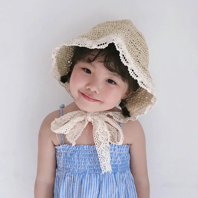 Stylish girls' khaki straw sun hat with lace band, offering excellent sun protection for young children