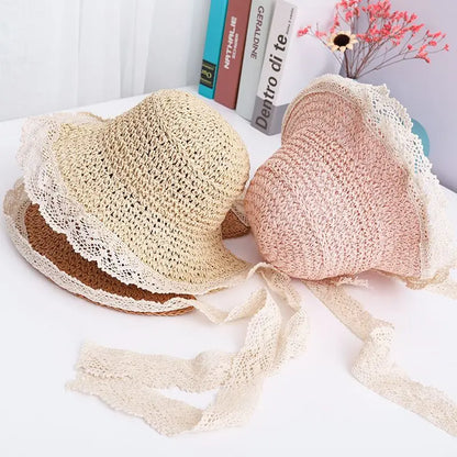 Front view of kids' khaki princess lace straw sun hat, providing stylish sun protection for girls