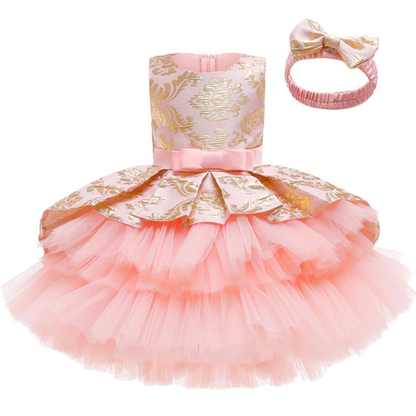 Girls' pink layered tutu dress & matching floral headband, perfect for wedding or party.