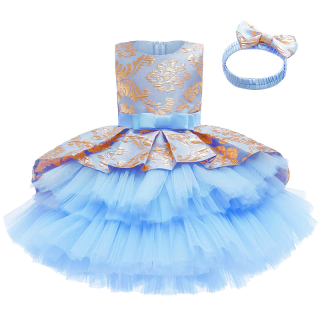 Purple layered tutu party dress & floral headband for girls, ideal as a birthday outfit.
