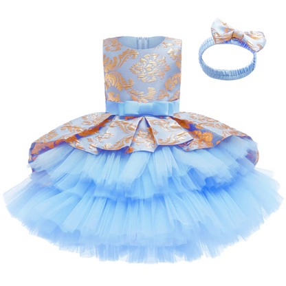 Purple layered tutu party dress & floral headband for girls, ideal as a birthday outfit.