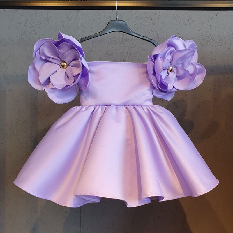 Set includes a soft layered tutu dress & floral headband, designed for young girls.