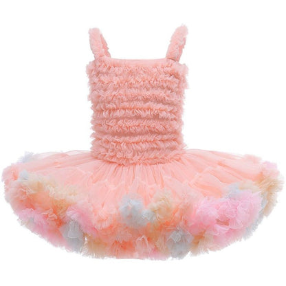 Toddler girl in a white mesh tutu dress with ruffles, a charming summer princess outfit