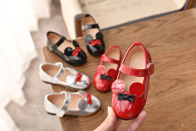 Pair of vibrant purple patent leather flats for girls, anti-slip and easy to wear toddler shoes