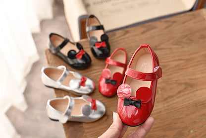 Pair of vibrant purple patent leather flats for girls, anti-slip and easy to wear toddler shoes