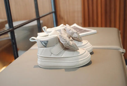 Gray kids' snow boots, warm and fashionable with an easy hook loop closure