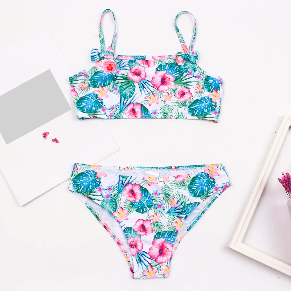 Girls' bow deco bikini set in cheerful print, durable and comfortable children's swimwear