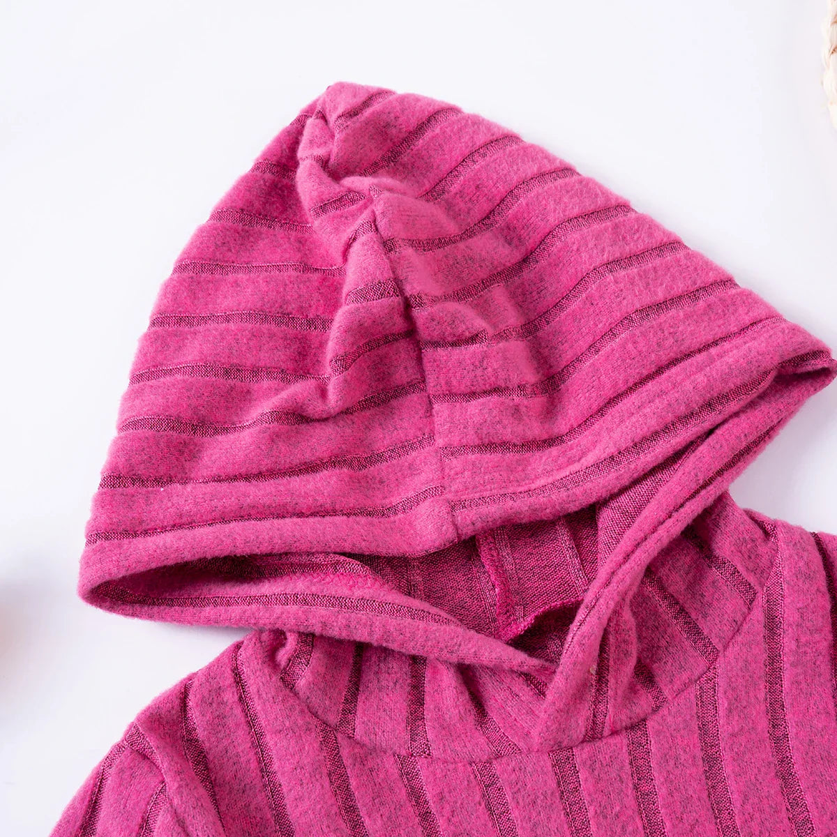 Pink girls' tracksuit pants, soft polyester for warm and cozy winter childrenswear.