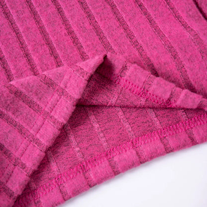 Full view of a girls' cozy pink tracksuit set, warm polyester for winter kids fashion.
