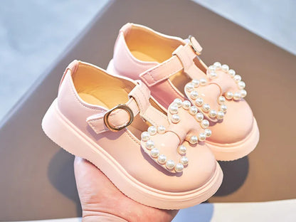 Girls pink princess flats, lightweight and comfy, with a cute bow-knot and pearl design.