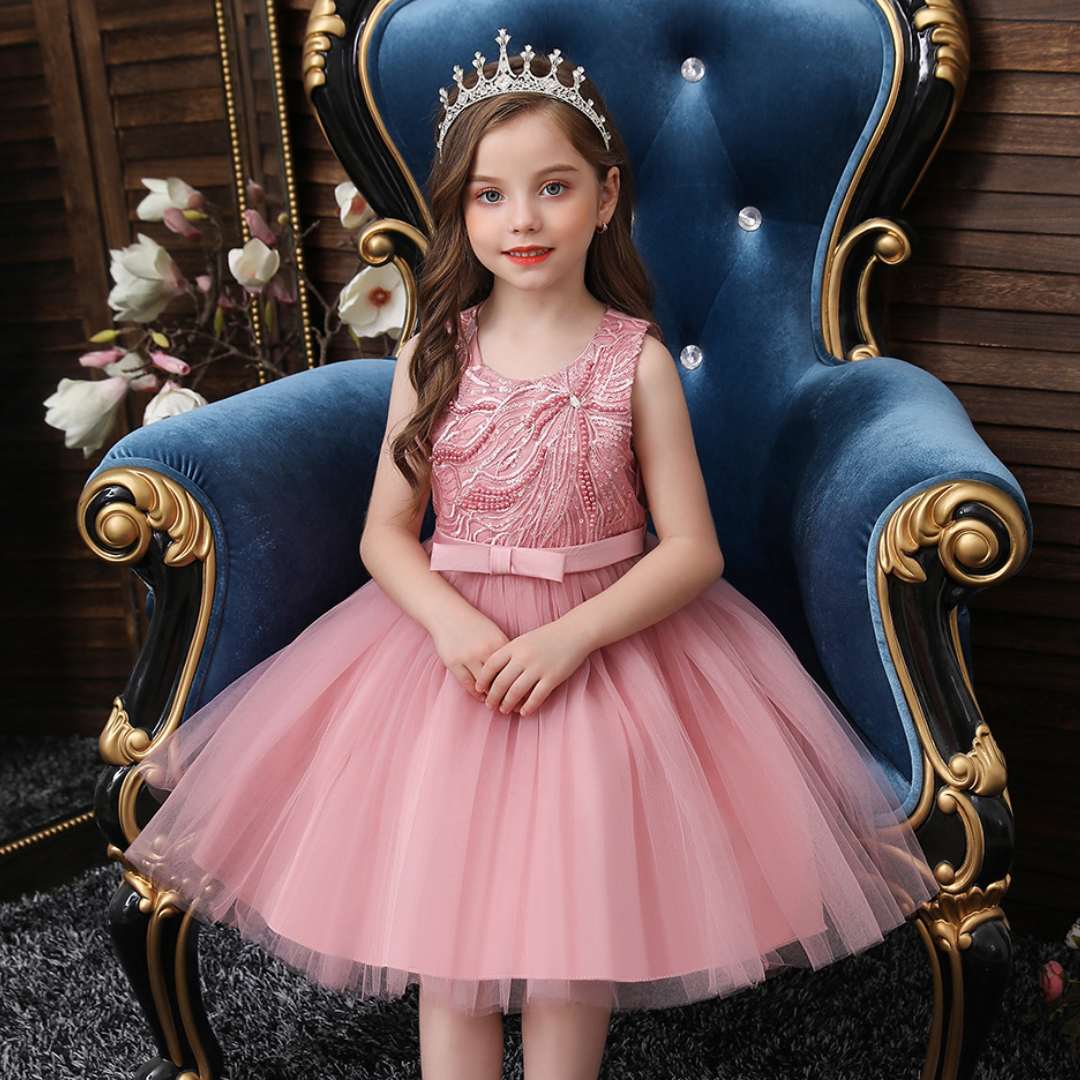 Girls' pink princess party dress with pearl and sequin embellished bodice, sleeveless design
