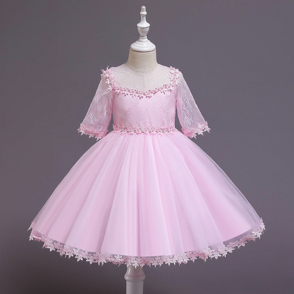 Childrens fashion: light pink sleeveless princess dress with shimmery sequins and pearls
