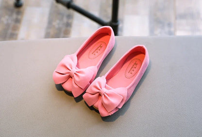 Green girls' slip-on sandals with a cute bowtie, made from durable PU leather for children
