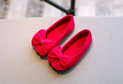 Girls' white flat sandals with a large bowtie, suitable for various summer occasions