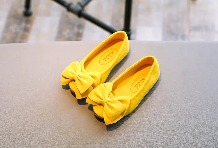 Red PU leather slip-on sandals for girls, featuring a cute bowtie and comfortable design