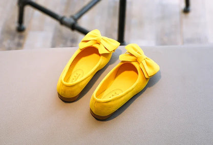 Girls' colorful bowtie slip-on sandals, an essential part of summer fashion for toddlers