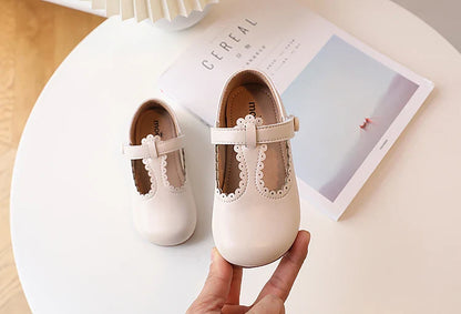 Soft interior lining of girls' T-strap flats, ensuring comfortable wear for vintage princess shoes