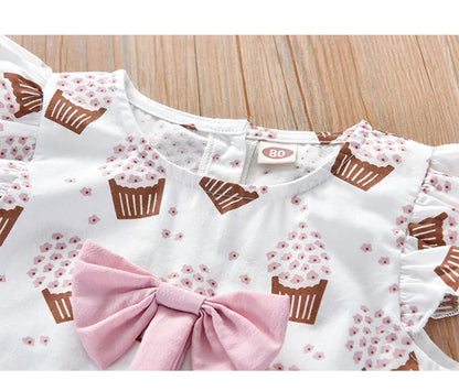 Girls' stylish sleeveless summer outfit in pink with an ice cream motif and large bow